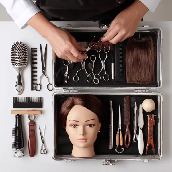 Professional cosmetology kit with scissors and tools